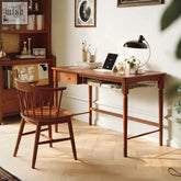 Warm-toned cherry wood sarah office desk with single drawer and wire shelf paired with matching spindle-back chair