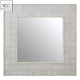 Silver-toned satara wall mirror with a square hammered metal frame featuring circular indentations for wall decor