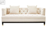 Cream-colored sefira 2 seat ivory fabric sofa with tufted button detailing and dark wooden legs fabric sofa