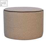 Beige serenity large round footstool with textured fuzzy snow white boucle fabric and dark brown piping on top edge