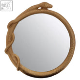 A round serpent wall mirror with dramatic texture featuring a golden brown rope like snake frame