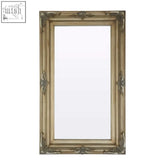 Antique gold sevan wood frame wall mirror with ornate carved detailing on rectangular wood frame edges