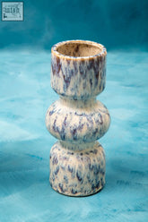 A ceramic shai medium speckled vase with stacked geometric design and creamy white and deep purple glaze