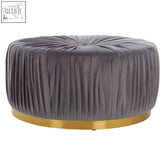 Shea grey footstool with gray velvet upholstery and gold-tone circular base perfect as a stylish grey footstool