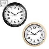 Black and cream siffer chrome finish plastic wall clock with white face black numerals and silver hands