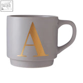 Gray ceramic monogram mug with gold letter a on side from signet grey monogram collection