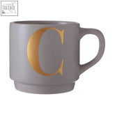Gray ceramic monogram mug with gold-colored letter c on the side perfect for a personalized grey c monogram mug