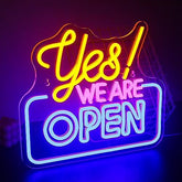 Vibrant led neon sign with yellow yes and pink blue we are open text perfect for bar restaurant shop decor
