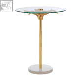 Sika small side table with gold finish, clear glass top, and white marble base for stylish living spaces