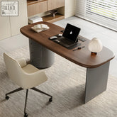 Modern simao office desk with solid wood top, gray pedestal base, storage drawers, black laptop, and minimalist lamp