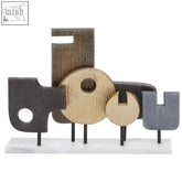 Abstract wooden metal sculpture with black gold and gray letterforms on white marble base simbolo large assorted colors