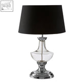 Elegant skye table lamp with clear glass base chrome stand and matte black drum shade for stylish lighting
