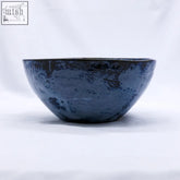 Small smoked grey tidal blue wash handmade ceramic stoneware bowl with deep textured blue glaze and tone variations
