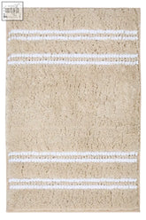 Small light beige bath mat with three white textured loop pile stripes perfect for bathroom use