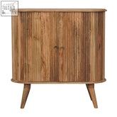 A rustic soba nordic chest of drawers with vertical slats and tapered legs in natural oak finish mango wood