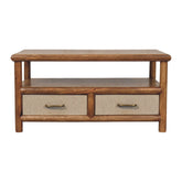 Rustic solara rattan coffee table with natural wood finish, two beige fabric lined drawers, and brass handles