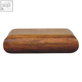 A sleek solis wall mounted bedside table made of natural mango wood with rich brown tones and a smooth finish