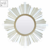 Sorrel wall mirror with a sunburst design featuring white glass panels and a light beige wooden frame