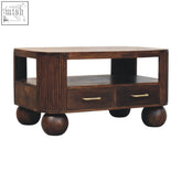 Dark brown california walnut coffee table with two drawers and sphere leg design for concealed storage