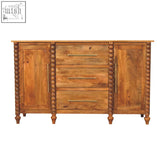 Warm-toned natural mango wood spindle sideboard chest with bead-column legs and brass drawer pulls handcrafted design