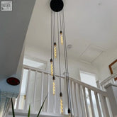 Spiral cascade chandelier black circular ceiling fixture with five edison bulb lamp holders ideal for stairwell lighting uk client area lead time included