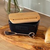 Black ceramic butter dish with natural wood lid engraved spread the love and silver heart shaped knife set