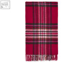 A red ives check wool throw with black and white stripes soft woolen texture and fringed edges perfect for cozy use