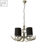 Stag 4 light antler chandelier with metallic finish and black fabric shades for rustic lighting decor