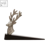 Silver stag door stop with textured antlers and sleek black wooden wedge base for holding doors open