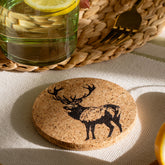 Circular portuguese cork coaster with a black deer silhouette, heat resistant and perfect for drinks protection