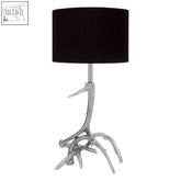Silver-coloured nickel stag table lamp with antler base and black cylindrical shade for stylish lighting