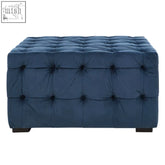 Deep blue velvet button stool with classic tufted design and dark wooden legs perfect for stylish seating