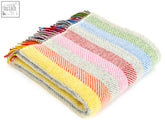 A soft rainbow grey pure new wool throw with vibrant pastel stripes and multicolored fringe, 183cm including fringe, perfect for a double bed