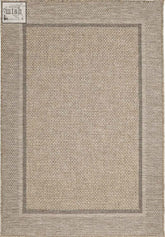 Beige woven summer latte border rug with textured basketweave pattern and subtle border for indoor outdoor use