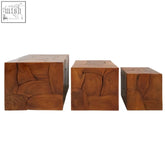 Three rustic solid teak wood cube side tables with natural finish and unique carved patterns for versatile use