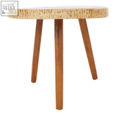 Surak sonokeling wood side table with a round textured beige top and three slender solid sonokeling wood legs