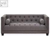 Surina 2 seat grey fabric sofa with grey tufted velvet upholstery rolled cylindrical pillows and nailhead trim