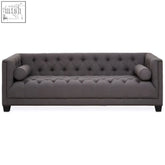 Surina 3 seat grey fabric sofa with dark grey tufted upholstery rolled armrests and nailhead trim