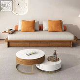 Modern wooden sutoro sofa daybed with walnut finishes soft white cushions and bright orange throw pillows
