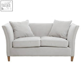 Light gray tufted fabric sofa loveseat with wooden legs perfect as a grey fabric sofa for small spaces