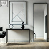 Black matte ceramic vase with sleek teardrop shape placed next to takara full length black metal rectangle mirror 150cm x 60cm