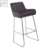 Dark gray velvet bar stool with sleek chrome legs from the tamzin grey velvet bar chair collection with low arms