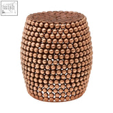 Templar copper finish barrel stool with copper-toned round seat covered in small textured spherical beads