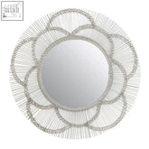 Silver-toned circular floral effect wall mirror with delicate woven wire frame and intricate petal-like design