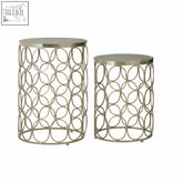 Two nickel finish templar marble side tables with circular ring patterns and flat tops in metallic design