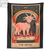 A black devil tarot tapestry featuring a pink cartoon goat with yellow eyes and a pentagram on its forehead framed by flames and rainbow