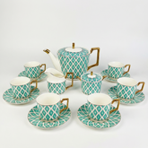 The Edwardian tea set bone china tea pieces with turquoise white geometric patterns and gold toned handles and rims