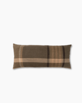 A brown plaid rectangular throw pillow with beige and dark brown stripes in the logan lumbar cushion style