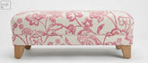 The york foot stool features a cream and pink floral upholstered top with high density foam on a solid wood frame with leg options