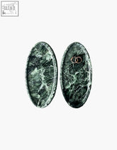 Elegant oval-shaped green marble thelonious plate tray with white veining perfect as a stylish bathroom tray